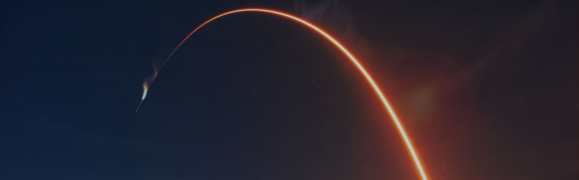 Missile launching through night sky